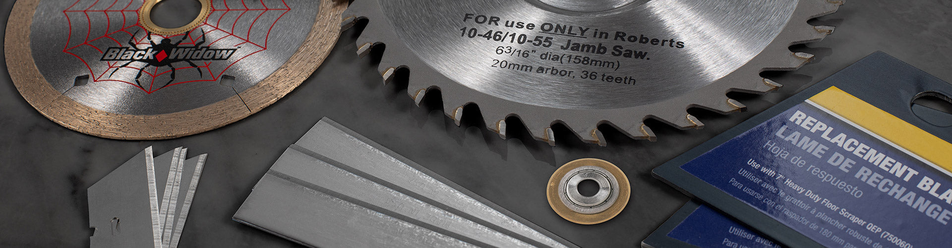 A variety of QEP and ROBERTS saw blades, flooring cutter blades, knife blades, and tile cutter scoring wheels