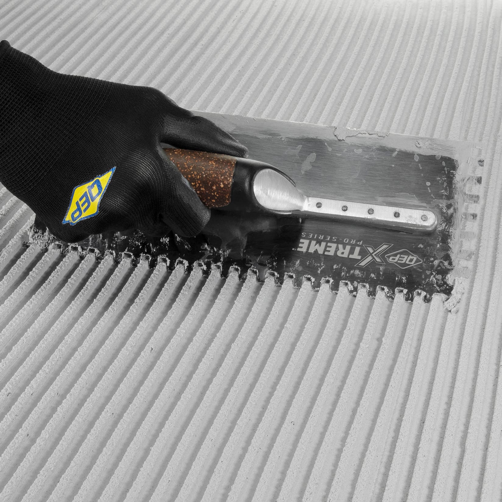 1/4" x 3/8" x 1/4" Cork Handle XL Square-Notch Flooring Trowel - 3