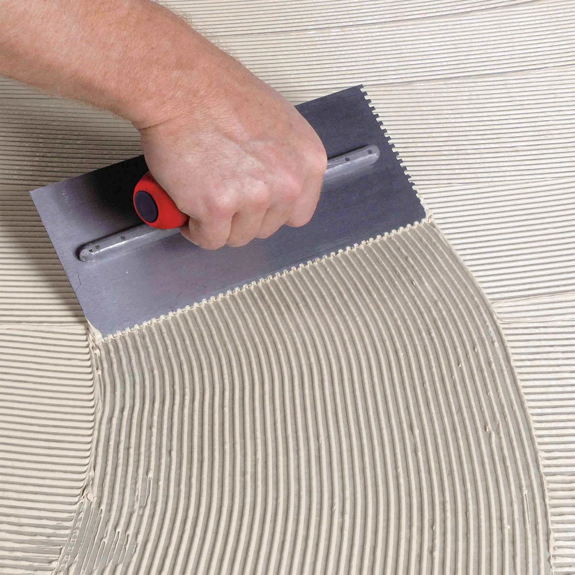 1/16" x 1/16" x 1/16" Square Notch Comfort Grip Trowel - 2