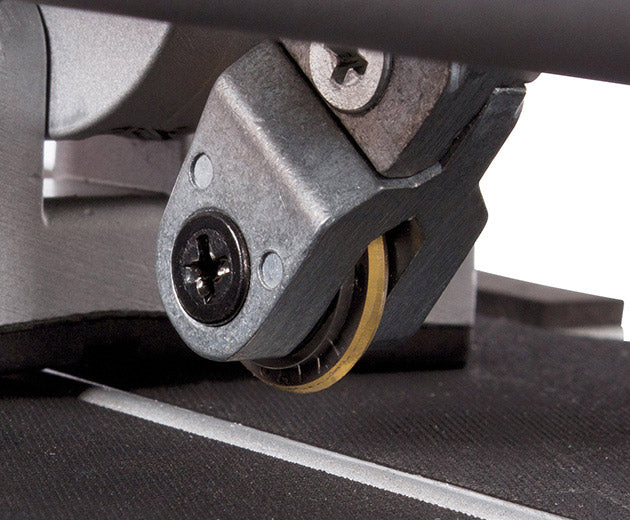 Close up image of a cutting wheel on a tile cutter