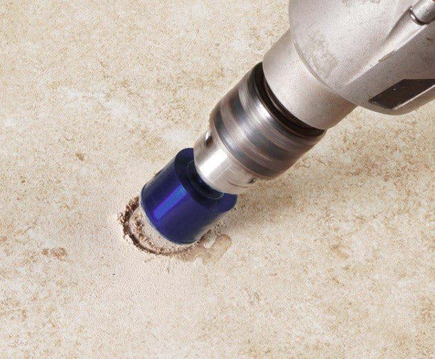 QEP Xtreme Diamond Hole Saw making a hole in a tile