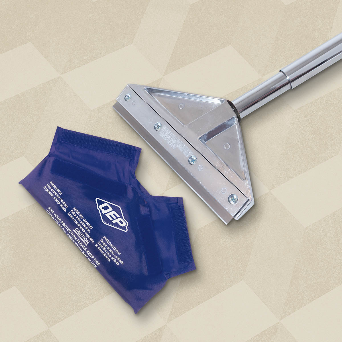 QEP Scraper Blade Cover shown with a scraper