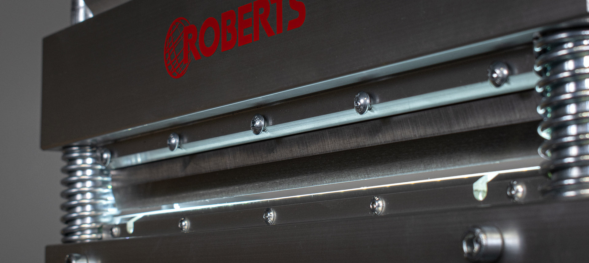 Close-up shot of the cutting blades on a ROBERTS 25" PrecisionCuts Pro Multi-Floor Cutter